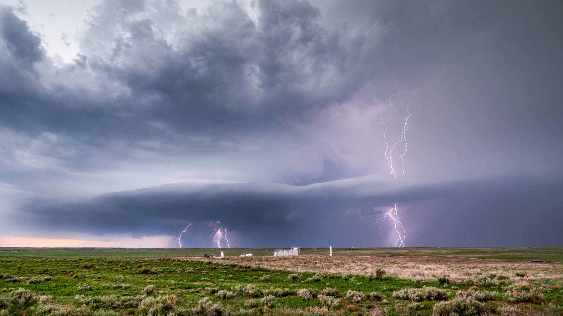 Storm clouds building over the flat plains of West Texas